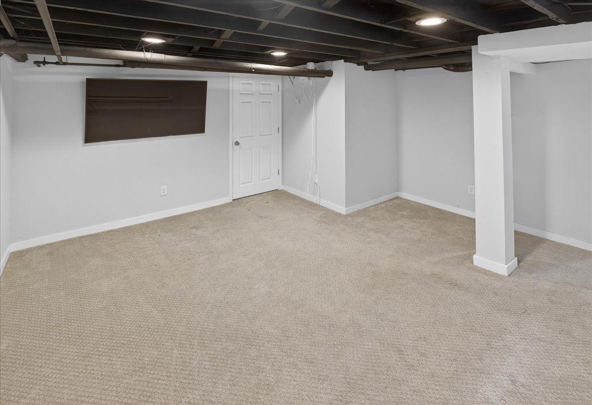 Large lower level living room.