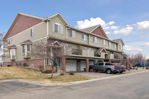 Welcome home to this updated and impeccably maintained end-unit townhome located in the highly sought-after Wilds neighborhood of Prior Lake.