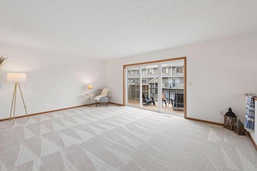 Step inside to enjoy all-new paint and carpet throughout, along with new light fixtures that brighten the home’s open and modern feel.