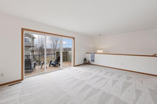 Enjoy sunset views from the west facing living room and deck.