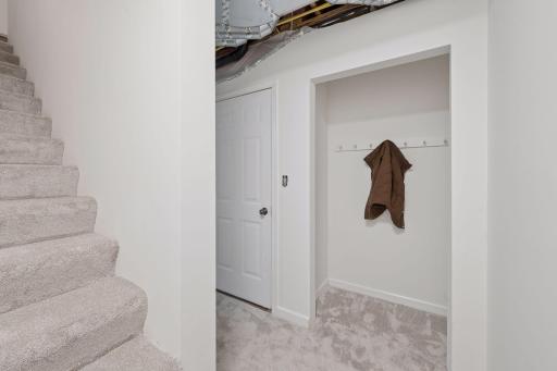 On the lower level there is a large closet as you enter the home from the garage. It is a two-stall garage with additional storage space.