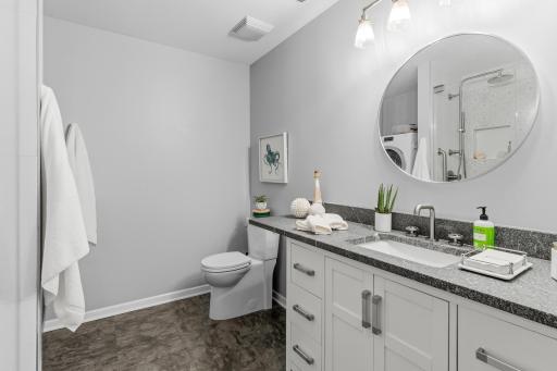 Newly remodeled $30k bathroom with custom faucets, fixtures and lighting.