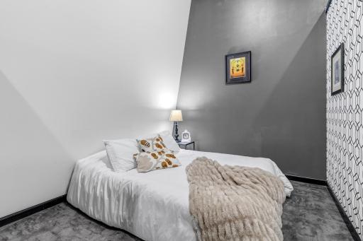 Your first view inside the unit is the flexible 2nd bedroom. One may choose to use this space as a bedroom, sitting room, den / office, craft studio - let your imagination speak for itself - for you!