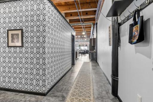 Welcome to #216, an inviting and warm space to call home. This unique unit will have you at 'hello'. Notice the 14' ceiling height. The artistic design of this unit speaks volumes in taste and creativity.