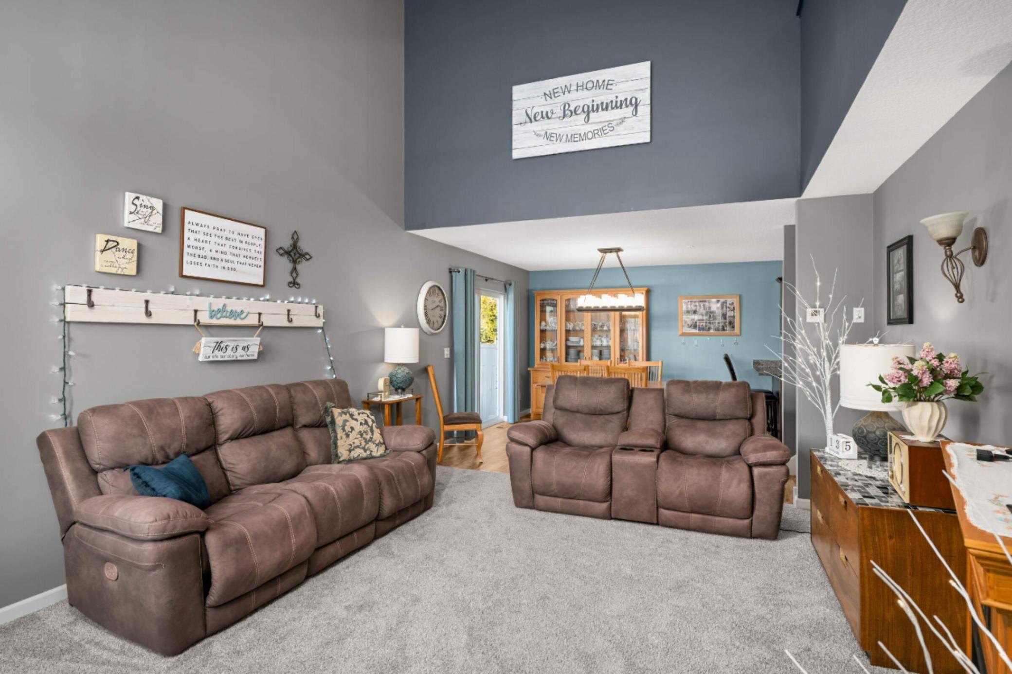 Large main floor living room with two-story ceiling
