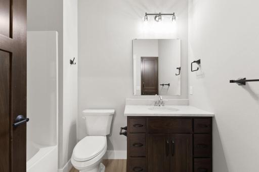 Continue down the hallway to find full bathroom perfect for daily routines.