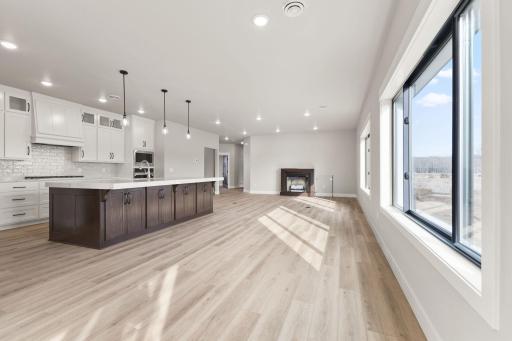 Open concept design connect the kitchen, living room, and dining room - ideal for entertaining and daily life.