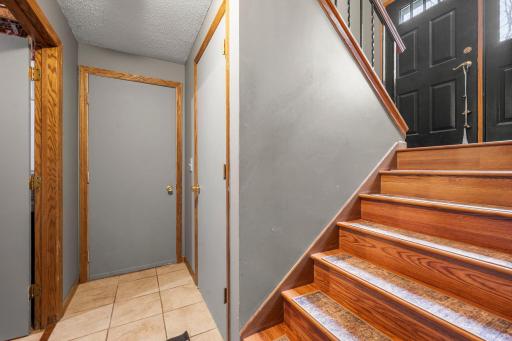 Lower level to garage, storage and laundry