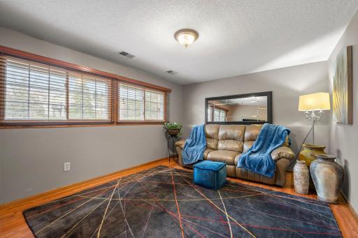 Family room with large windows for more natural light