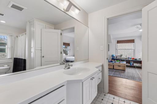 Upper level full Jack and Jill bathroom.