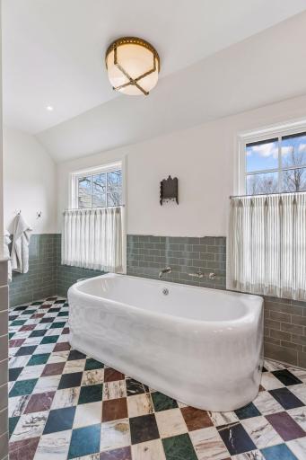 Designer cast-iron soaking tub imported from London.