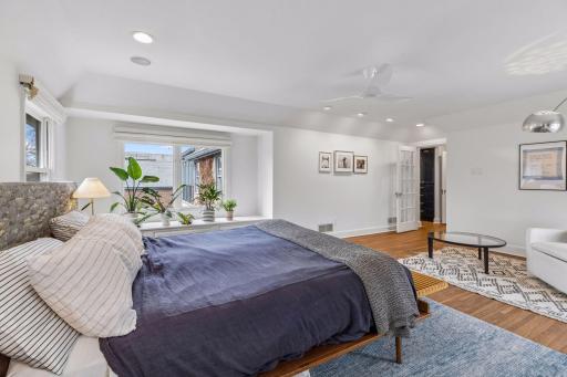 Primary suite with separate walk-in closet and full bath.