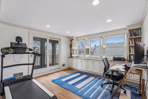 Upper level office area and screened-in balcony.