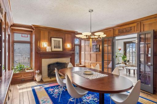 Formal dining room. Beautifully maintained original mahogany paneled walls and dental moulding.