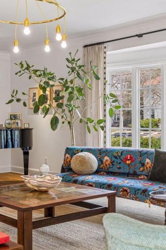 Formal living room with abundant natural light.