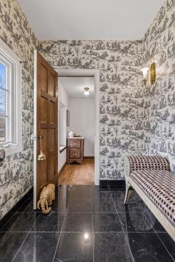 Lounge area adjacent to the formal powder room.