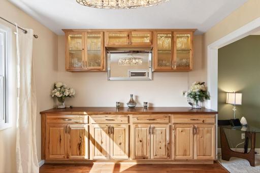 Functional elegance. A stunning custom built-in that adds both architectural interest and practical storage to your dinner parties.
