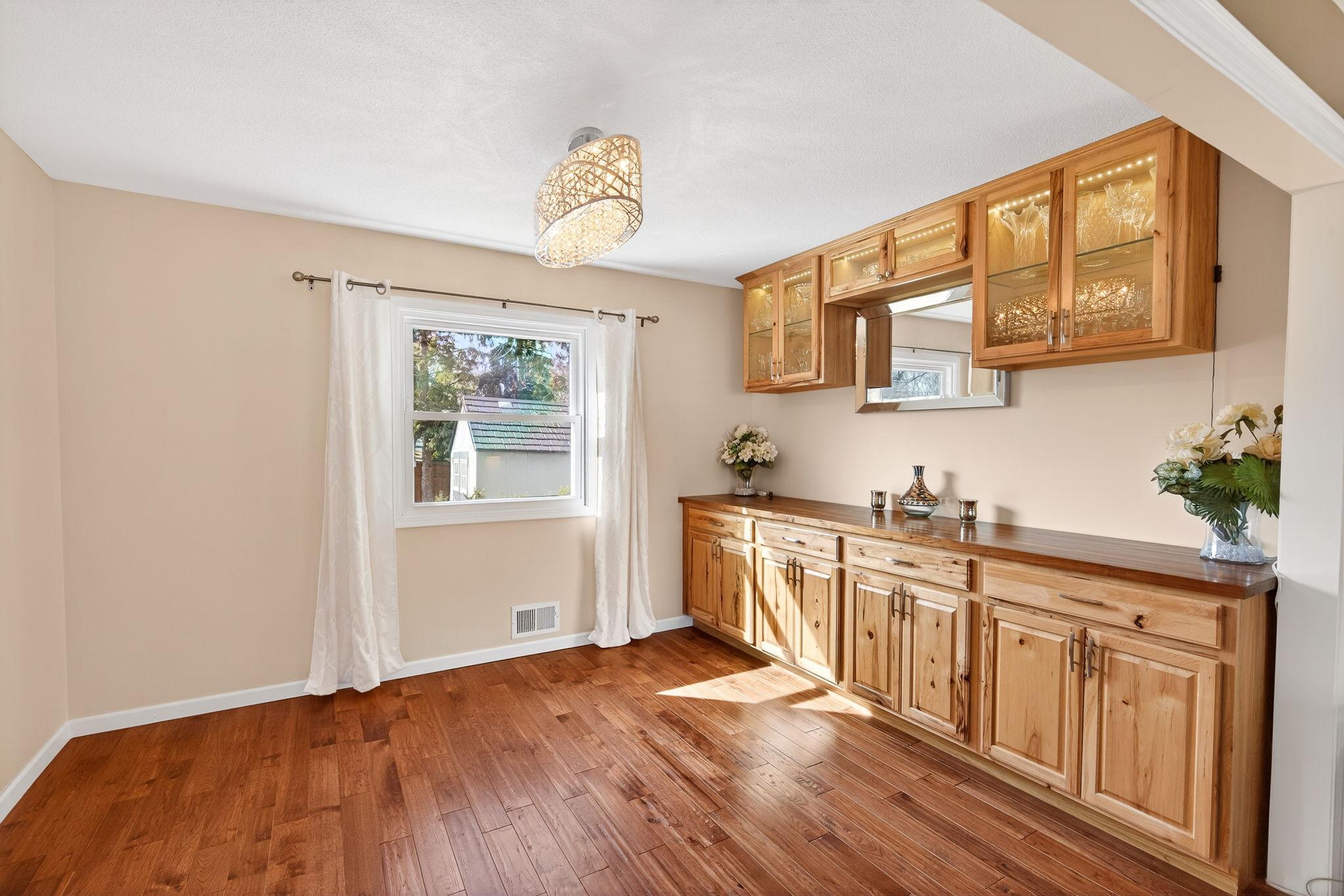 Sophisticated flow. The formal dining room with its new built-in hutch complements the casual eat-in kitchen area.