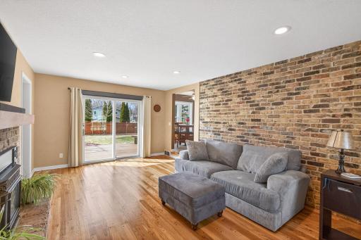 Seamless indoor-outdoor living. Step out from the family room to a private deck overlooking the manicured grounds