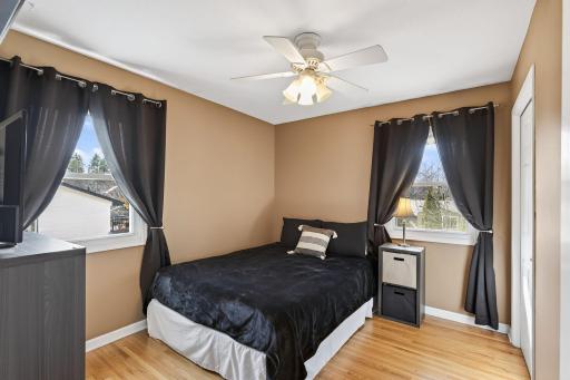 Comfort and character. This generously sized bedroom features neutral tones, an oversized closet, and easy access to the full hallway bathroom.
