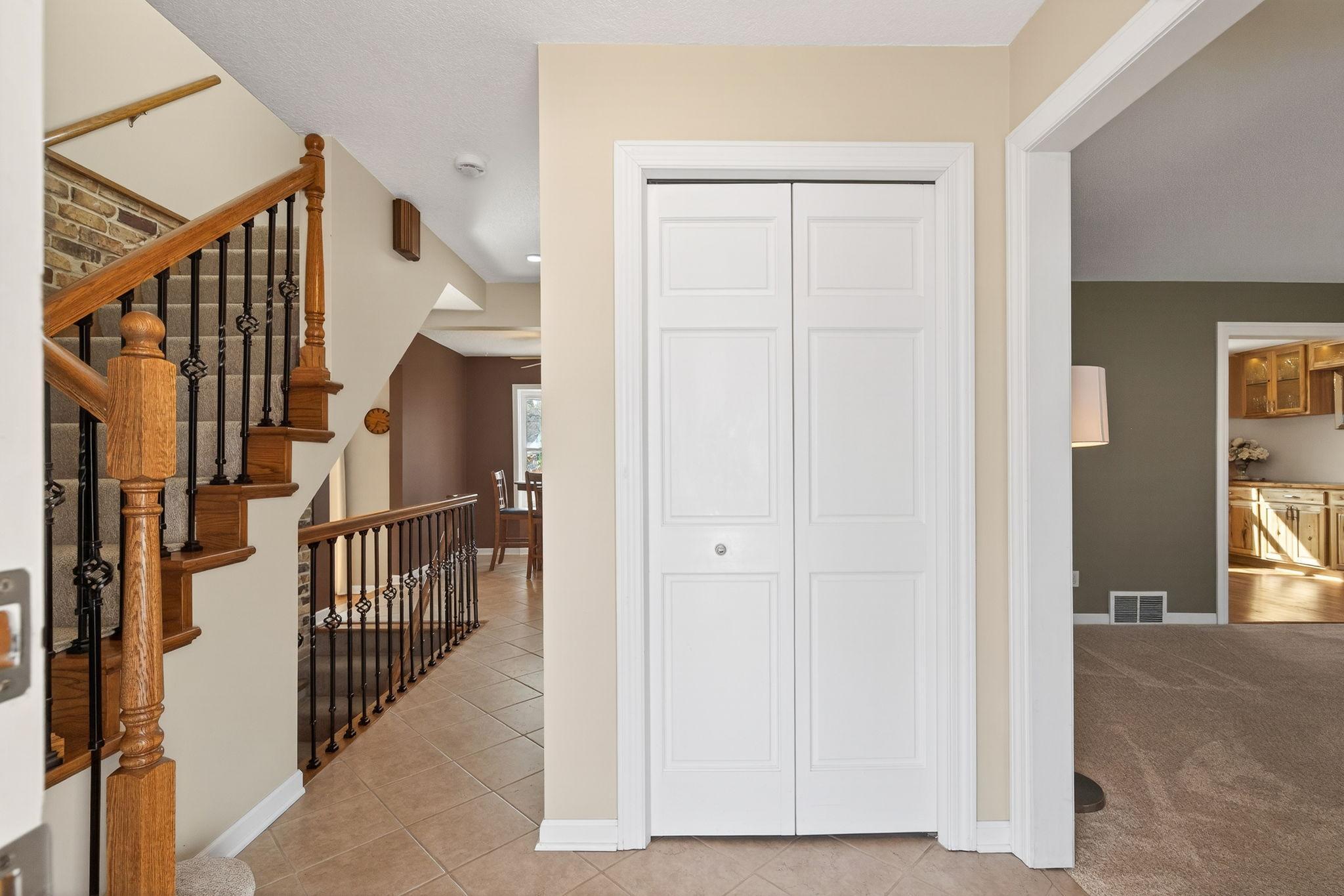 Classic craftsmanship. Iron railings lead you to the rare four-bedroom upper level, all featuring original hardwoods.
