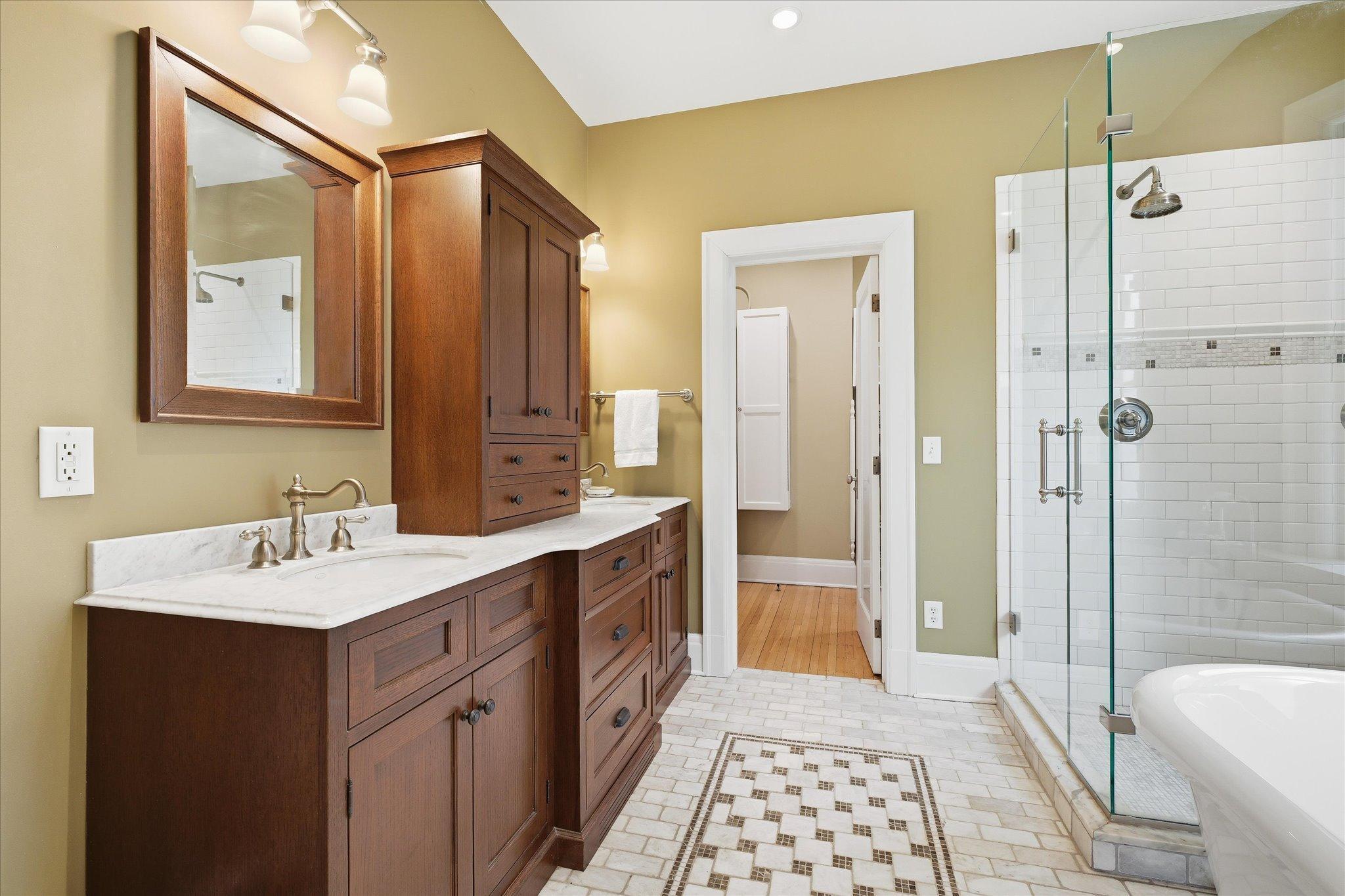 Private bathroom attached to primary bedroom with heated floors