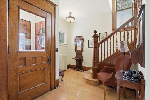 Grand foyer with stunning original woodwork