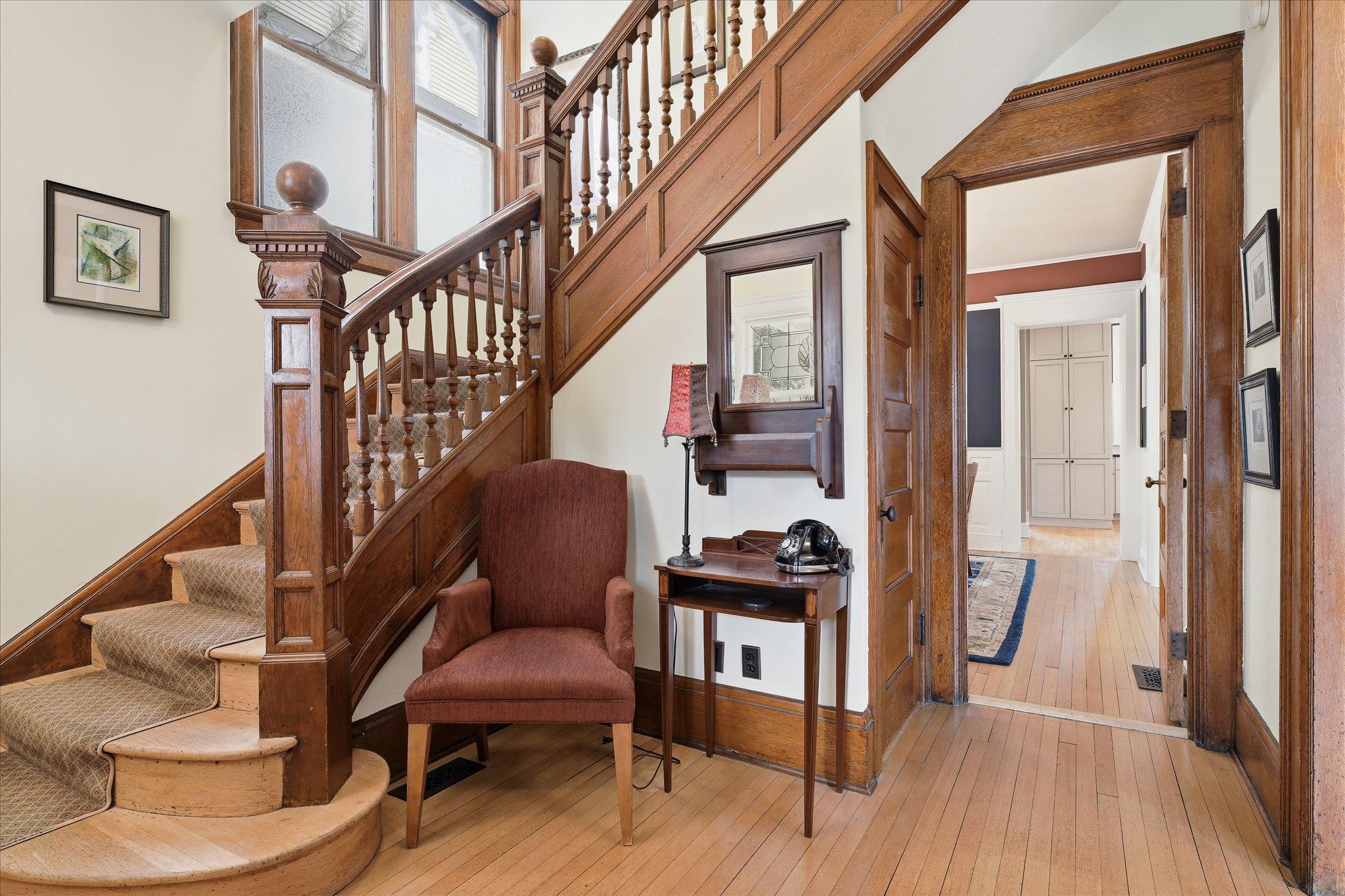 Grand foyer with stunning original woodwork
