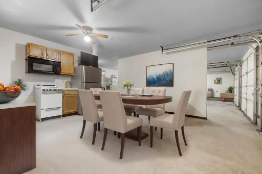 Kitchen/dining in detached garage/mancave staged pic