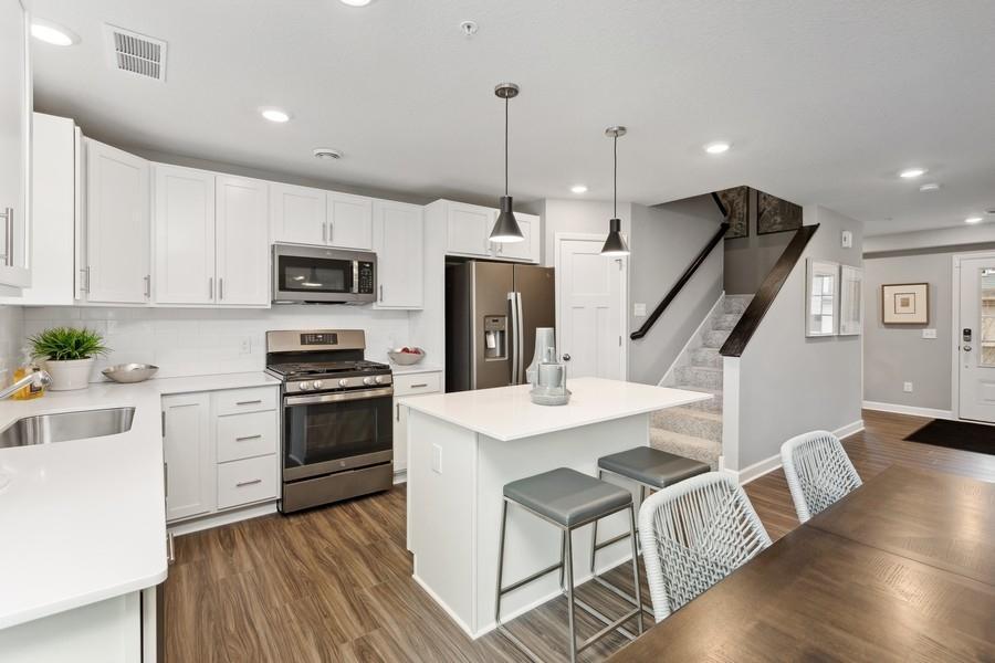 (Photo of decorated model, actual home's finishes will vary) Imagine preparing a wonderful meal for dinner in this kitchen or entertaining friends and family over the weekend!