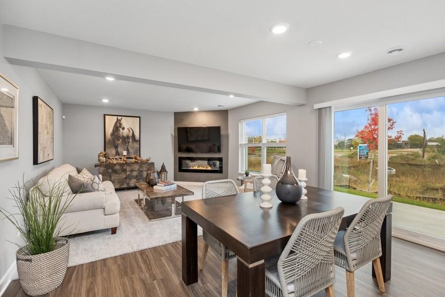 (Photo of decorated model, actual home's finishes will vary) Enjoy a movie night by the electric fireplace!