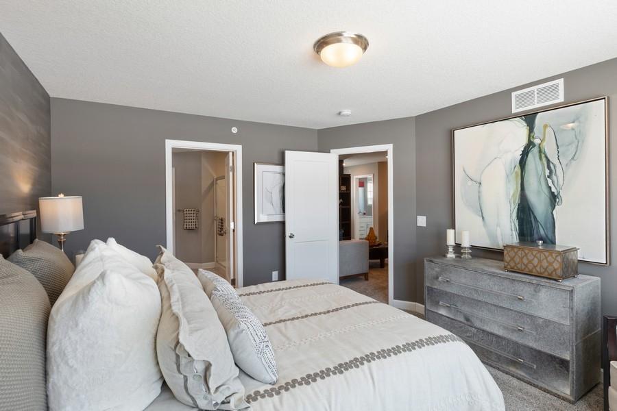 (Photo of decorated model, actual home's finishes will vary) Find your retreat in this stunning owner's suite!