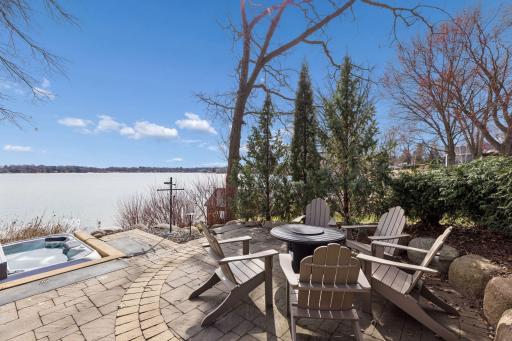 The patio offers a comfortable outdoor space overlooking the lake, with room for dining, seating, and everyday enjoyment.