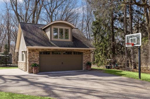 Heated 2-car detached Garage with space above.