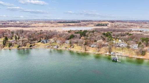 Aerial view highlighting the property’s setting and position along Turtle Lake.