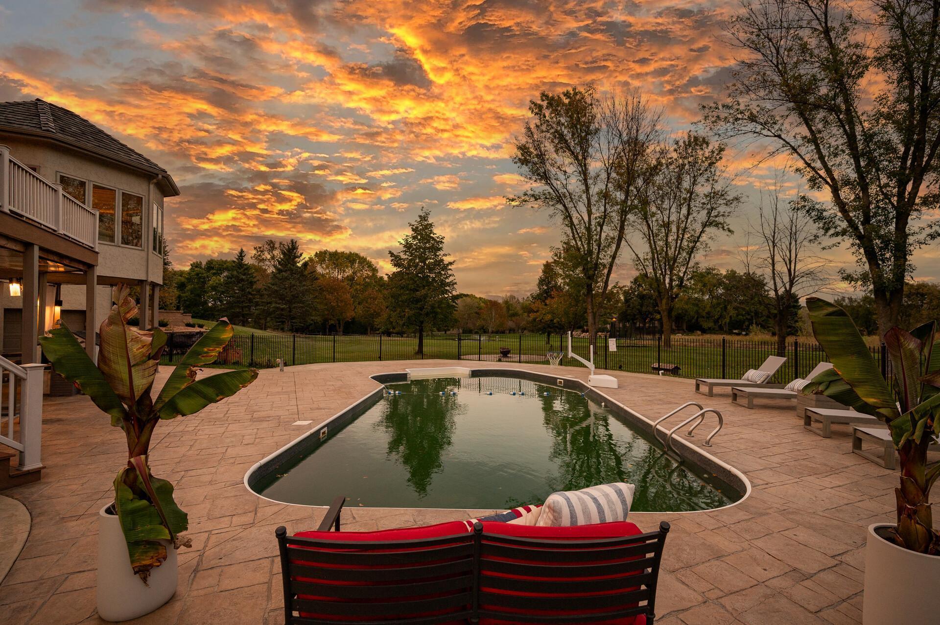 Another breathtaking view of the pool and tranquil backyard.