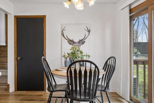 Gather around the table in the dining area.