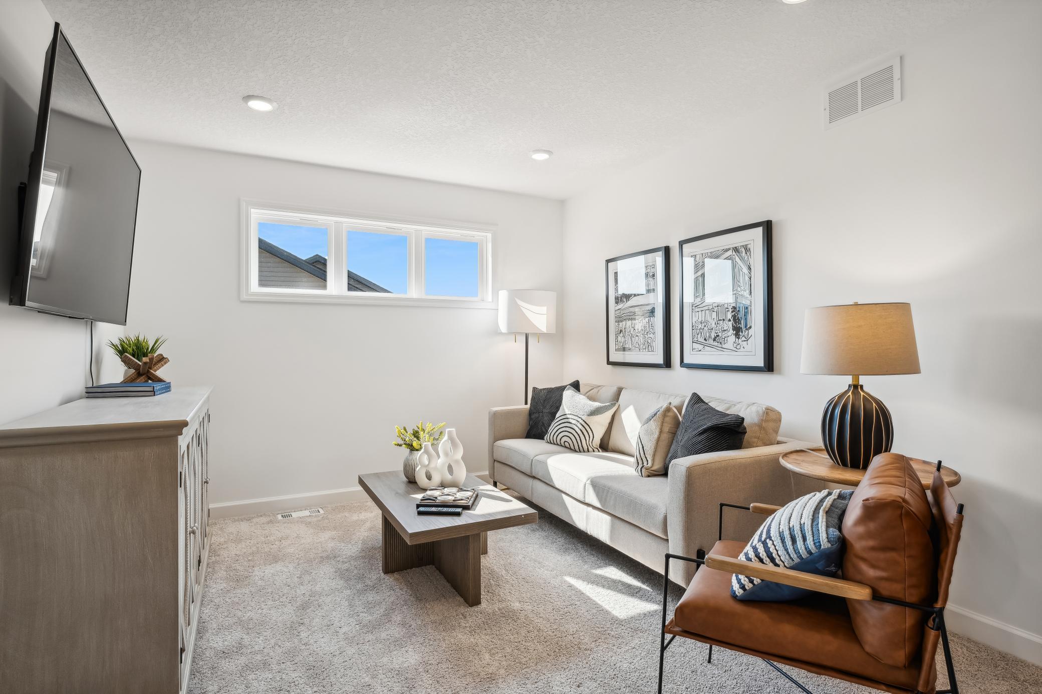 (Photos of model home, features will vary) The loft area is located at the top of the stairs on the second floor and is well-suited for a living room or children’s area.