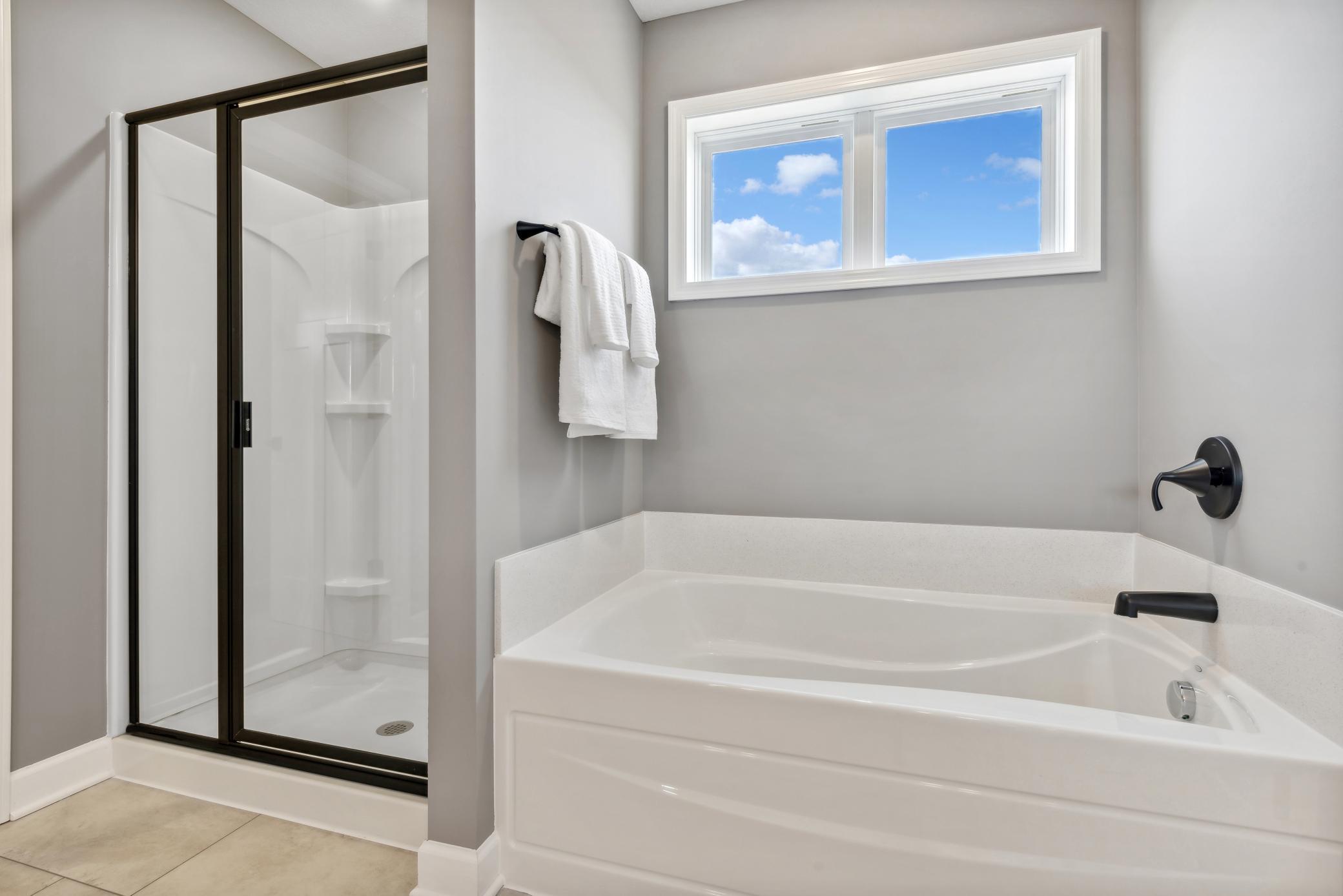 (Photos of model home, features will vary) The walk-in shower provides a spa-experience