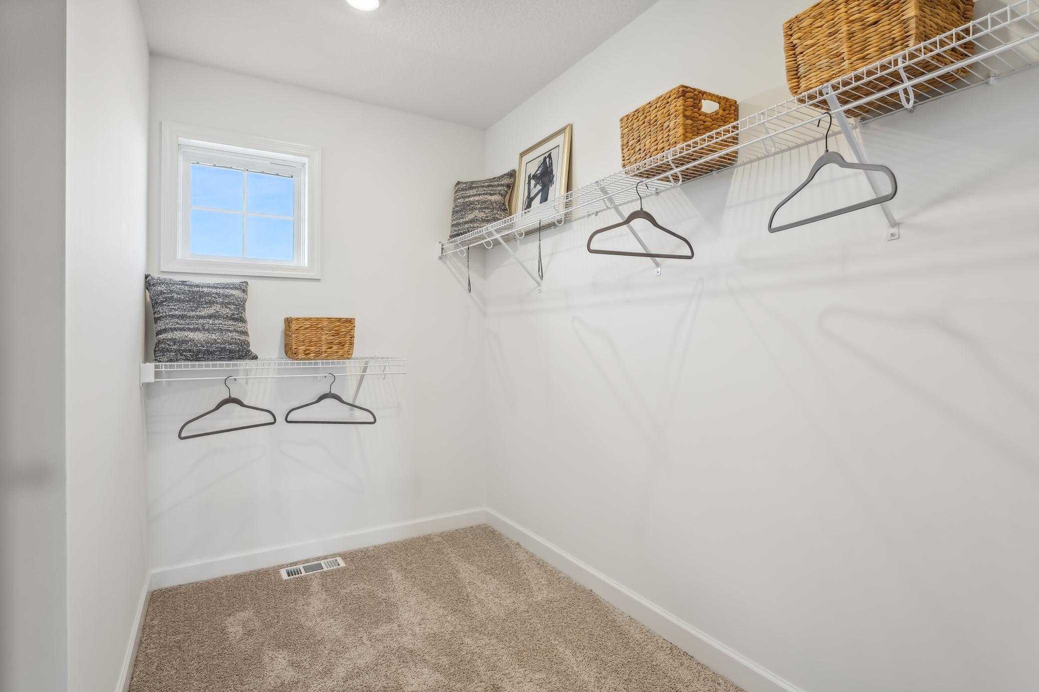 (Photos of model home, features will vary) The walk-in closet offers ample space and storage