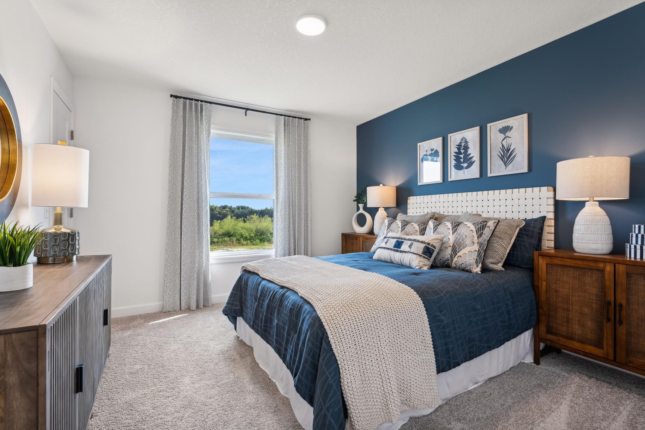 (Photos of model home, features will vary) The home has four bedrooms and is perfect for a growing family or someone simply looking for more space.