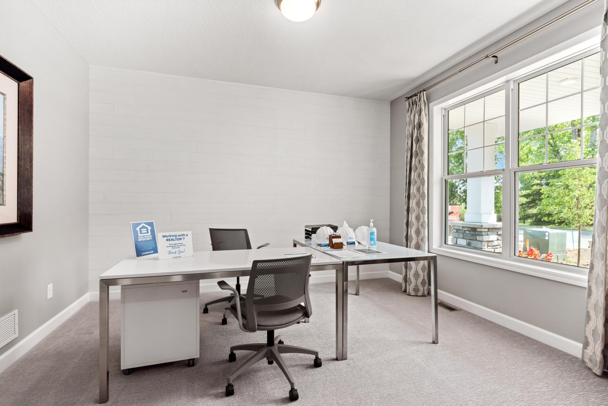 (Photos of model home, features will vary) Pictured here as an office, this guest suite is well-suited for the unique needs of any homeowner.