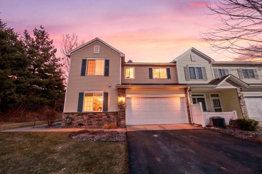 Beautifully maintained 2-bedroom, 2-bathroom end-unit townhome nestled in a serene Inver Grove Heights neighborhood!