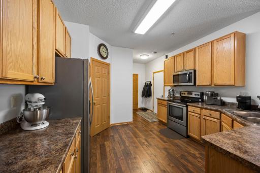 A walk-in pantry provides excellent storage and organization.
