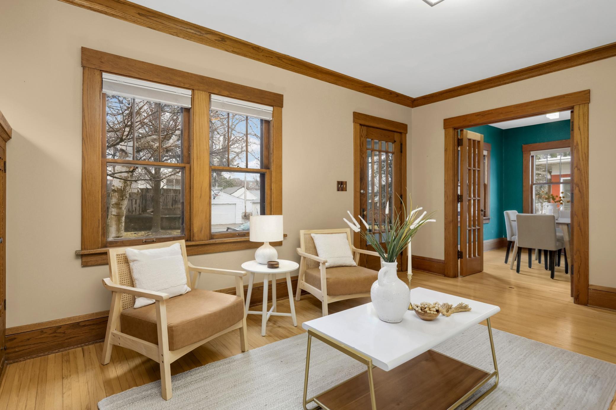 Living room and dining room are connected with French doors