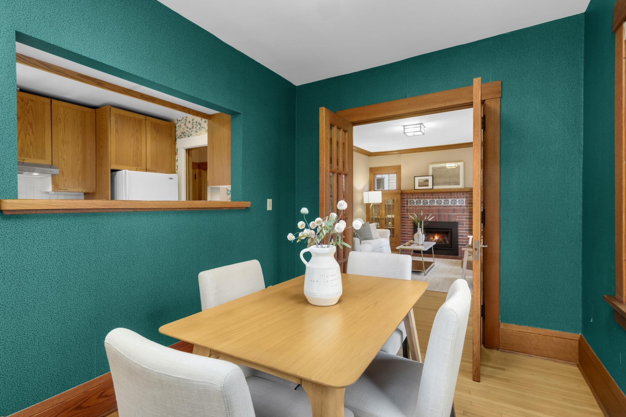 Cut out between the kitchen and dining room connects the spaces