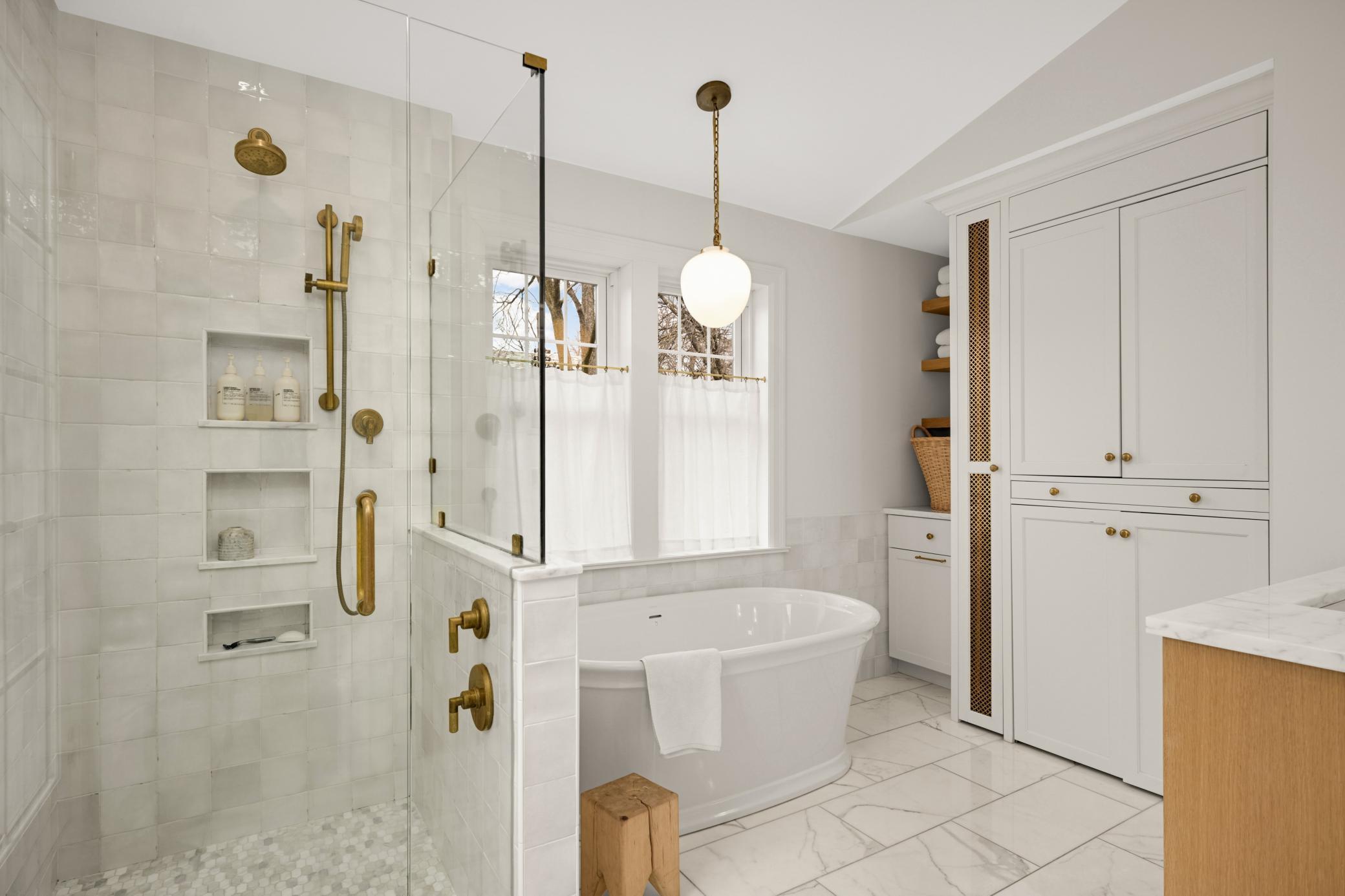 heated floors and under cabinet lighting gently illuminate the space