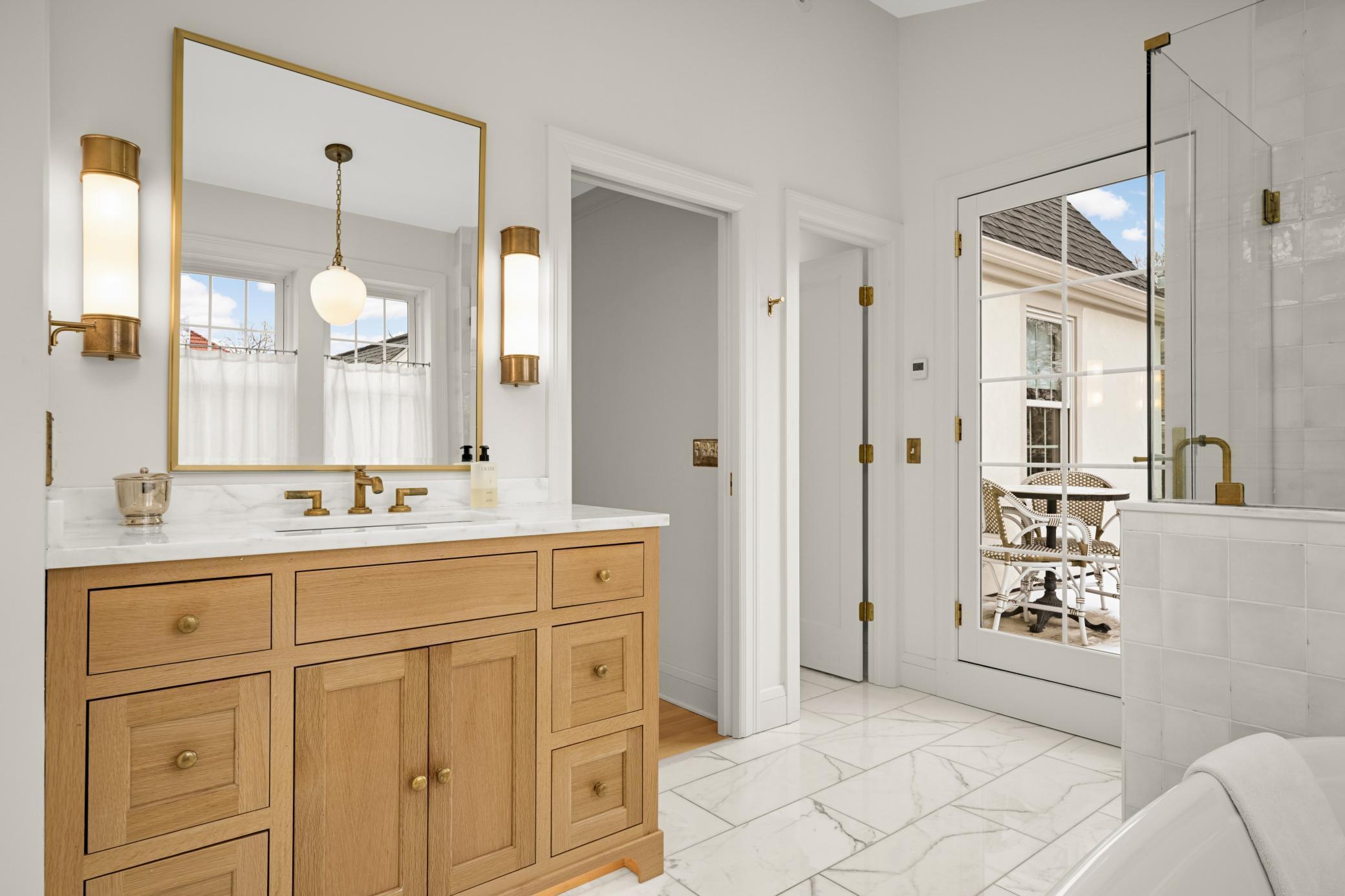 Step through the glass pane door out to...