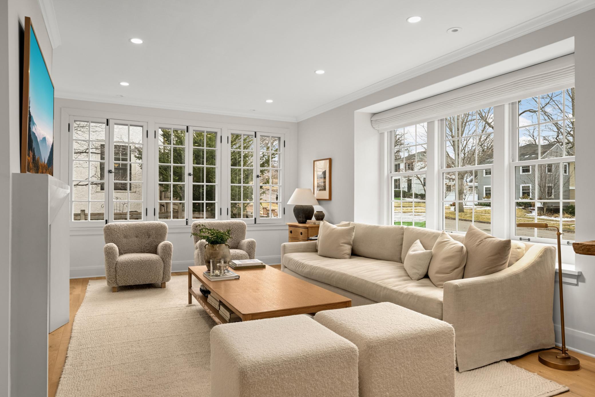 Preserved and restored French casement are an original feature of the home to uphold architectural integrity. All new Andersen windows other than these French casements.