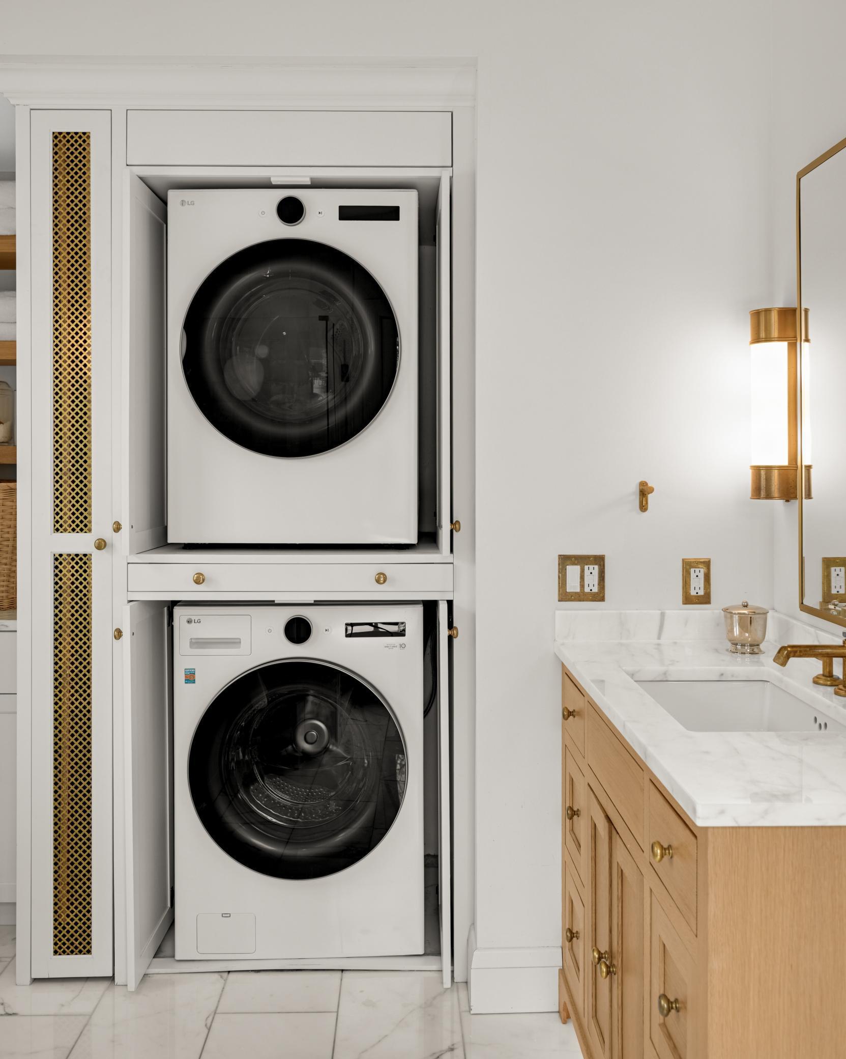 Dual laundry areas in this home - one in the primary ensuite, the other in the lower level